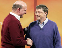 Bill Gates and Steve Ballmer shake hands on a job well done